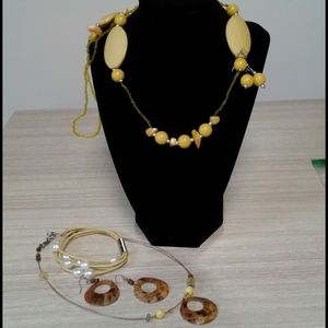 2 necklaces 2 sets earrings one bracelet